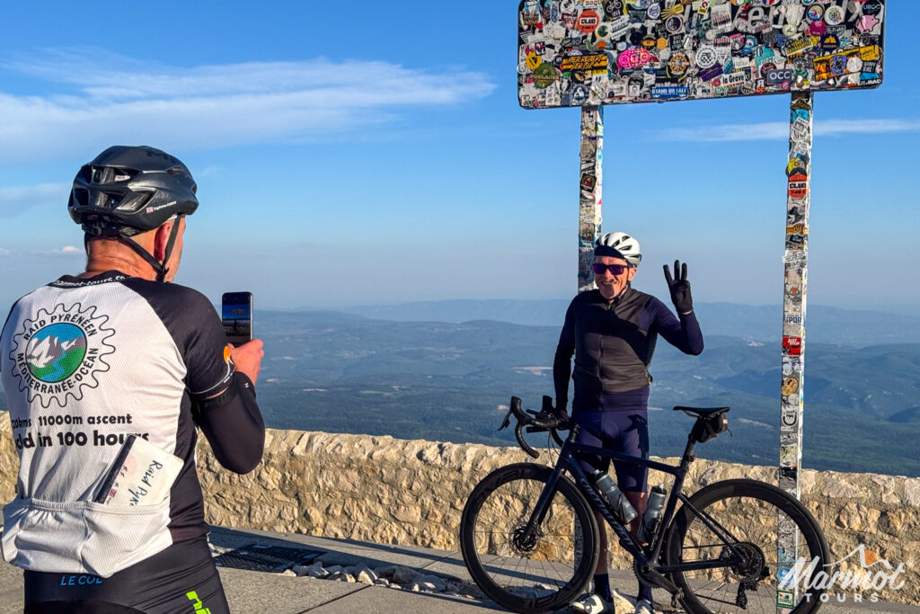 2 cyclists at the summit of Mont Ventoux on Marmot Tours Club des Cingles de Mont Ventoux challenge