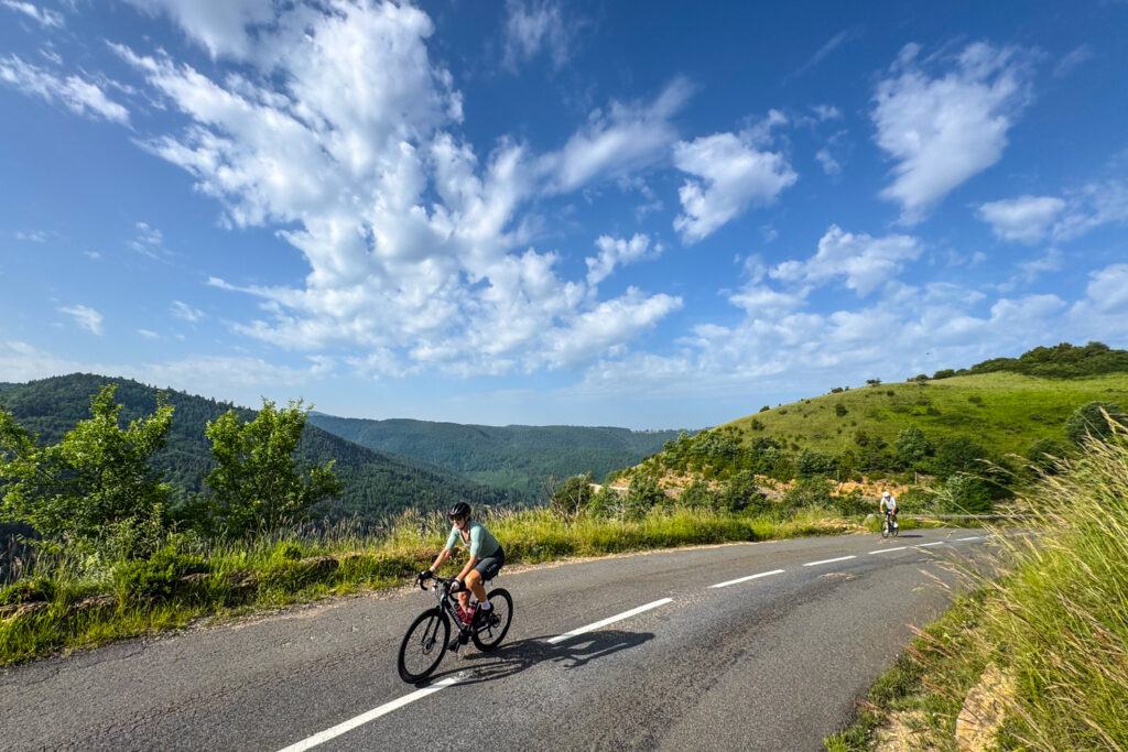 Cyclists enjoying hill climb on Cévennes and Ardèche cycling holiday in southern France with Marmot Tours