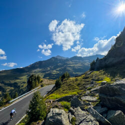 Cyclist climbing in mountains on Marmot Tours full support road cycling holiday Italian Dolomites