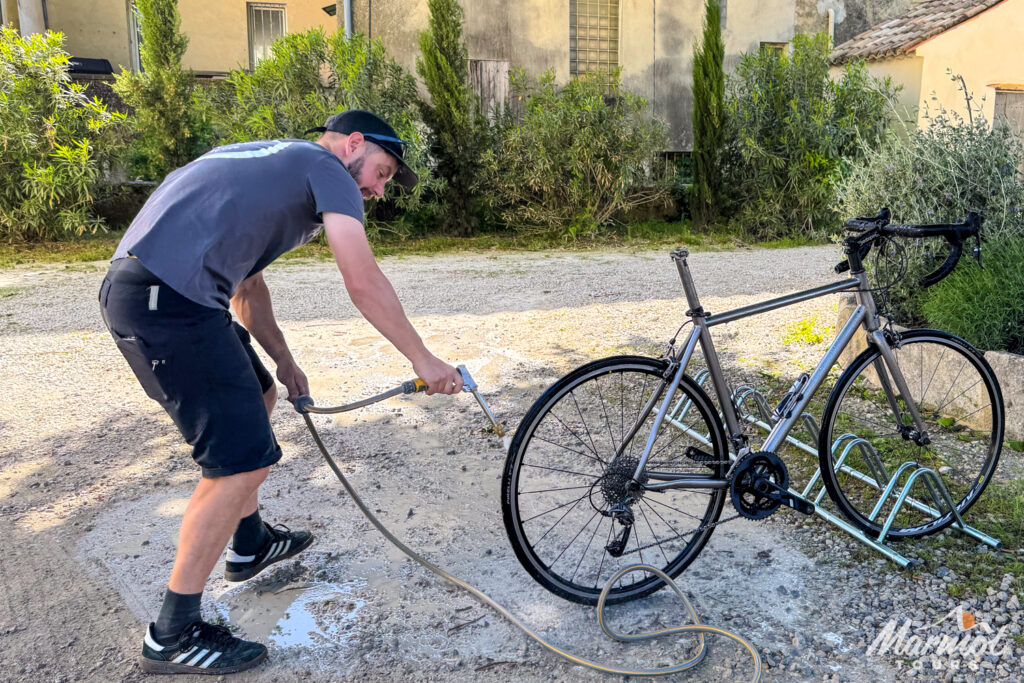 Marmot Tours guide Tom Mutton washing hire bike